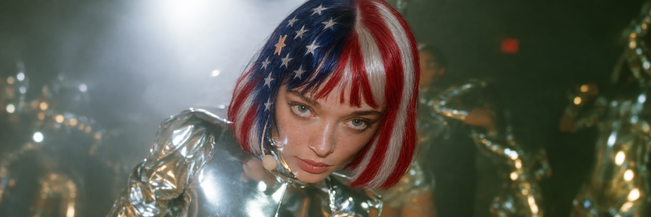 USACLAUDIA with stars-and-stripes patterned hair, a star clip and a reflective silver outfit